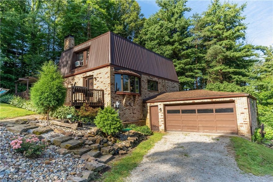 Looking for privacy? This home in Minerva, OH provides just that as well as prime hunting land, with exceptional convenience when traveling to nearby major markets. This home with a mansard style roof has so much character. Barn wood finishes, some updated flooring, and a spacious owners suite with a walk in closet & private screened-in deck overlooking nature. The upstairs also has two more large bedrooms & a full bathroom. The barn has multiple horse stalls & is ready for you to bring your horses. Plenty of woods to explore, & free gas with the property.