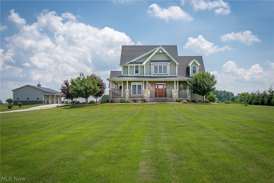 Details Make the Difference…Upscale Mini Farm in Edison School District.  Custom Home on 13 ACRES in Pristine Condition.  Enjoy the Cooling Breezes on a Warm Summer Night from the Wrap Around Sitting Porch up Front or from the Multi-Level Composite Deck Out Back Overlooking the UpGround POOL.  An Abundance of Natural Light Enhances the Main Living Area, While the Rich Brazilian Cherry Hardwood Compliments the Central Fireplace and Tasteful Built-Ins.  LR is Open to the Kitchen with Cambria Quartz Kitchen Counters, Stainless Appliances with Built In Microwave Drawer.  Formal Dining Room off the Kitchen. Relax in the Main Level Master Suite with Walk In Closet.  Master Bath has a Soaking Tub and Separate, Oversize, Walk-In Shower.   Three More Bedrooms and a full bath compliment the Upper Level with Balcony Overlooking the Main.  Full Finished Basement is Completely Set Up to Accommodate In-Laws, Guests, or Children.  Basement Kitchen with Stainless Appliances and Double Oven.  Step in Shower, Living Area and Three More Multi-Use Rooms.   Geothermal Heating for this All Electric Home.  Three Car Attached Garage.  Stamped Concrete PATIO.  For the Hobbyist, there is a 30x40 OUTBUILDING with Three Overhead Doors.  Beautifully Located and Landscaped.  Pool Table and Washer Dryer excluded