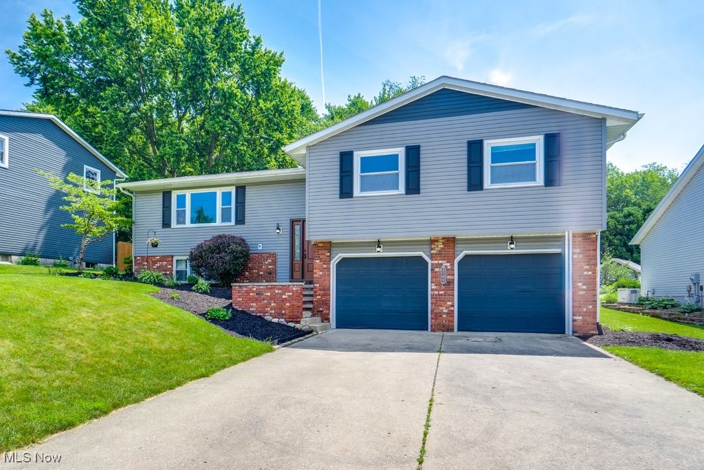 Well maintained home in quiet neighborhood. This home is lovely both inside and out! If you're looking for a home with plenty of room, this one has all the living space you need! The full basement level with finished space gives more options for family living or room to unwind. You will appreciate the secluded feeling of this home while also having quick access to town and beyond. A beautiful wooded backyard presents room for avid gardeners, bird watchers and nature buffs! Plan on evenings on the deck relaxing as the day winds down or spending time with the family! You won't want to miss this opportunity to secure your new home!