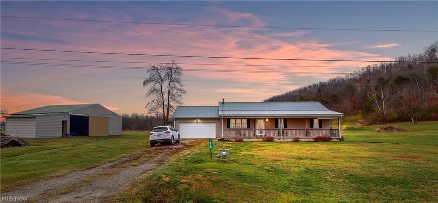 Hales Landing, Elizabeth Home and Hangar on 1.10 Ac +/- lot.   3 Bedroom/ 2 bath home-ranch style, built with 2 x 6 studs, with 2 stall garage and large front covered porch and covered back deck. Living room and Eat-in-kitchen. City water and private septic. Natural gas heat and beautiful tiles hearth and wall (wood burning stove). Laminate floors in living room, dining room and kitchen, tiled bathrooms, carpet in bedrooms and hall. Newer roof (metal). New back covered deck. Hangar measures 41' x 41' with an additional workshop area 20' x 16'. Hanger has 12' clearance. Property has Suddenlink cable service per seller. 
HOA-to join-is a one time $1700. fee afterwards just the HOA fee of $175 per year.