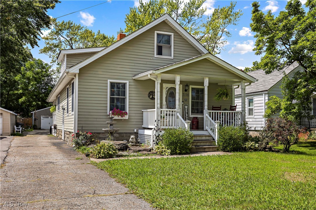 Elyria township Cape Cod, built in 1900, this adorable 2 bedroom/ 2 bath home has all the charm plus modern updates!
You'll just love this kitchen's granite countertops, farmhouse sink and stainless steel appliances. You can enjoy the
upcoming chilly fall nights next to your no maintenance gas fireplace as you relax in your living area. As well as the
convenience of a first floor main bedroom that has ample space at 14 x21. The newly waterproofed basement has a
transferrable warranty by Ohio State Waterproofing. This house is also solar panel ready with a net metering system.
Outside, get ready to have your own oasis for entertaining or simply escaping the hustle and bustle! Complete with a
partial wrap around porch, beautiful backyard patio and pergola, and built-in fire pit you'll still be able to enjoy as we
wrap up summer and head into fall. An extra large 2 car garage, 24 x 30, is ready to go with electrical. Don't wait,
schedule your appointment today
