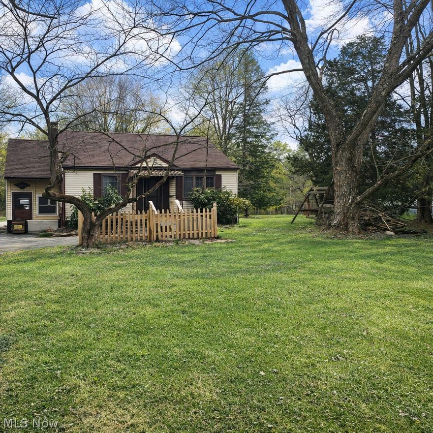 2 Bedroom Ranch on 2.23 Acres, Weathersfield Schools.  Hardwood floors with large living room, 2 nice size bedrooms, eat in kitchen. Home has a newer roof, newer forced air gas furnace.  Additional large entry room used as office. Large 2 car garage used as workshop.  Additional 48' x 24' pole building.  Exceptional piece of land with old growth trees and creek which is great for recreation and maybe future building site.  Septic test in progress.  Sale by order of Executor.
