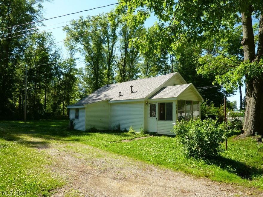 .35 Acre lot (3 parcels total) near the Lake Road strip of food, fun and tourist attractions.  A Two bedroom, 1 bath ranch (New wiring, roof, plumbing,HW tank & Furnace around 2004) plus 3 cottages. Per city of G-O-L inspection the cottages need to be repaired to pass inspection along with the sewer lines or they are to be torn down.  Properties sold in AS IN condition, enter at your own risk. Water lines replaced in 2006