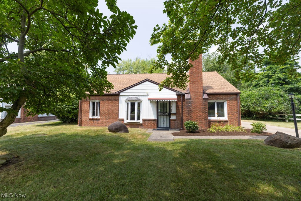 Welcome to 4011 Lancaster Rd in South Euclid! This 3 bedroom, 1 bath home with large yard is close to the Metroparks on a quiet street. Head in through the front door into the great room with plenty of natural light pouring in through the windows. The open concept great room with fireplace leads to the eat-in kitchen with island, granite counters and includes all appliances. The laundry room is off of the kitchen and has a stackable washer and dryer that are included with the sale of this home and also features a utility sink, cabinets and countertop space. The 2 car garage is off of the laundry room and has an attached storage shed. There are 2 spacious bedrooms and full bath on the main floor. The second floor has a large bedroom with plenty of closet space. Call today to schedule your tour to see this wonderful home in a great location in South Euclid!