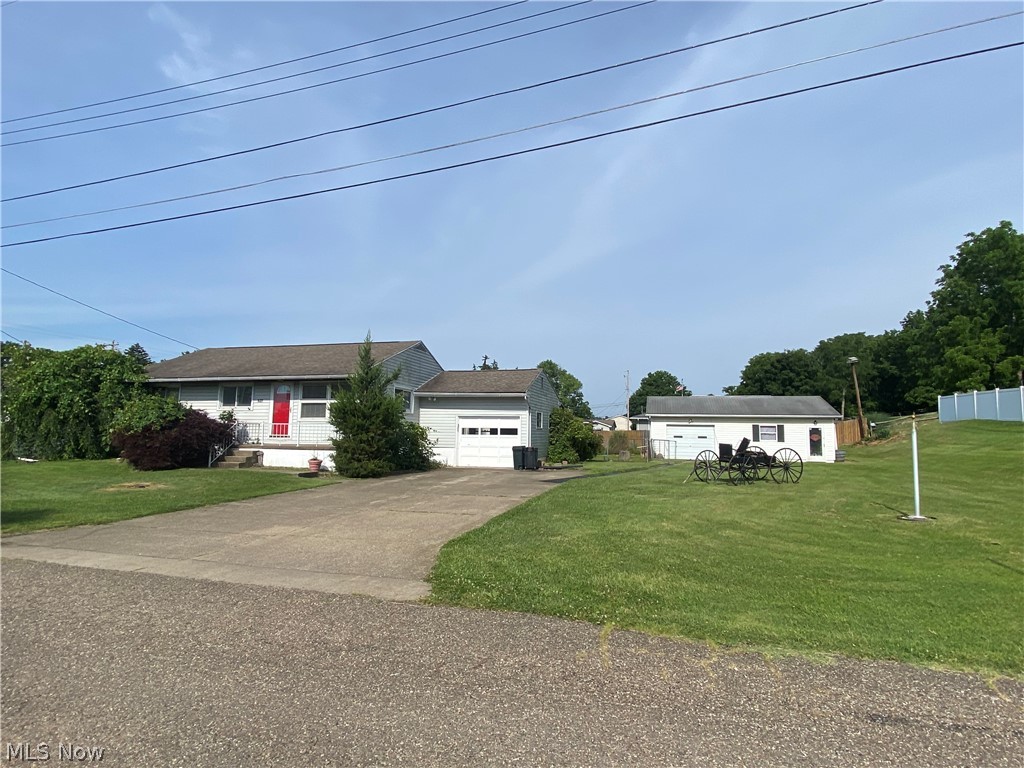 Come see this lovely ranch home with a basement on a double lot and extra detached garage! 3 bedrooms, 1.5 baths, updated kitchen, new carpet, Generac generator, full basement with space to finish and plenty of storage. You'll love the large yard and above ground pool!