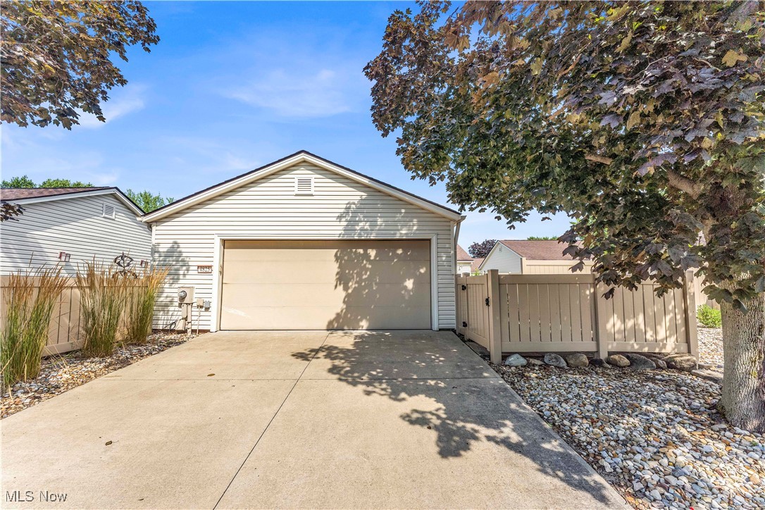 Welcome to this spacious and well maintained first floor condo in the desirable Creekside community of North Ridgeville! Featuring 3 bedrooms and 2 full baths, this ranch style layout offers convenient, single level living with 1,712 square feet of living space. Enjoy a bright and open floor plan, generous room sizes, and an attached 2 car garage for added convenience. While the home could benefit from a few cosmetic updates, it has been well cared for and provides a solid foundation to add your personal touches. The spacious living room flows into the dining area and kitchen, making entertaining easy. The primary suite includes an en-suite bath and large walk in closet. Additional highlights include central air, in-unit laundry, and access to a peaceful, well-maintained community offering two pools, tennis courts, a clubhouse, and a playground! Don’t miss your chance to own one of the few ranch style condos in this area!