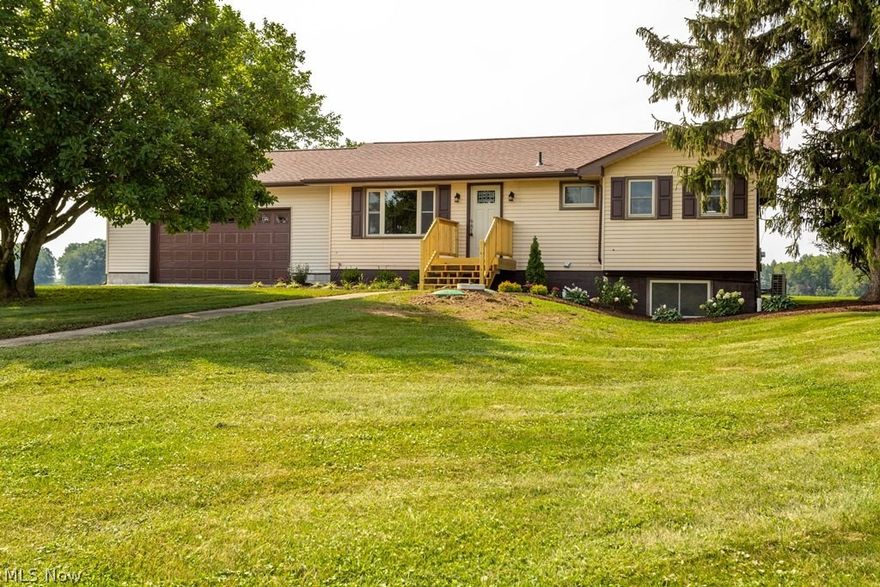 Looking for country living with seclusion? This home is for you! Privacy galore as this home sits 1600 feet off the road and is surrounded by farm land and the 2.934 acres is peppered with mature trees. The big magnolia tree in front yard has absolutely beautiful blossoms in the spring and adds to this perfect setting. The home has recently been redone from top to bottom with much care given to comfort and style. New oversized garage added and septic updated per inspection(see attached supplement paid invoice for septic work).   Also see attached list of updates with the word NEW used excessively. Includes a 24x40 steel outbuilding with concrete floor that could use some work but is useable. Contains 2 parcels.  Taxes have not been assessed due to recent split which has been approved by county.   See attached map.