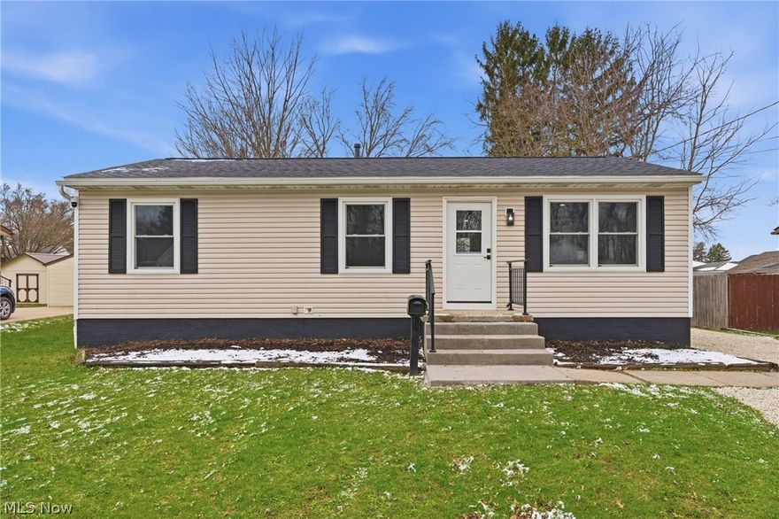 Is there a 3 bedroom ranch style home in Barberton with modern updates and true move-in ready appeal? 176 Grace Ave delivers a fully remodeled interior, open concept living, and additional finished basement space, all set near nature trails, highways, and downtown Barberton conveniences. Welcome to this reimagined 3 bedroom ranch style home in Barberton, where every detail has been thoughtfully updated to create a clean, modern, and comfortable living experience. From the moment you step inside, the open concept layout creates a natural flow between the living area and the eat-in kitchen, making the space feel bright, connected, and easy to enjoy day to day. The kitchen serves as the centerpiece of the home, featuring quartz countertops, a spacious island with seating for four, new appliances, and a layout designed for both casual meals and gathering with friends. Beyond the main living area, the home offers three bedrooms and two full bathrooms, all updated with fresh, contemporary finishes. An additional 600 finished square feet in the basement expands your options, whether you need a second living area, home office, fitness space, or entertainment zone. Major improvements including a new roof, windows, AC, furnace, and electrical panel provide peace of mind and contribute to the home’s efficient, like new feel. Outside, the detached two car garage with electric adds convenience and functionality, while the location ties it all together. Situated in the Barberton City School District, this home is within walking distance to the Ohio and Erie Canal Towpath Trail, perfect for outdoor enjoyment, and just minutes from downtown Barberton’s shops, dining, and local amenities. With quick highway access and close proximity to Portage Lakes, commuting and recreation are both within easy reach. Offering the style of a new build with the value of an established neighborhood, this home is an ideal fit for first time home buyers or anyone seeking a move-in ready lifestyle.