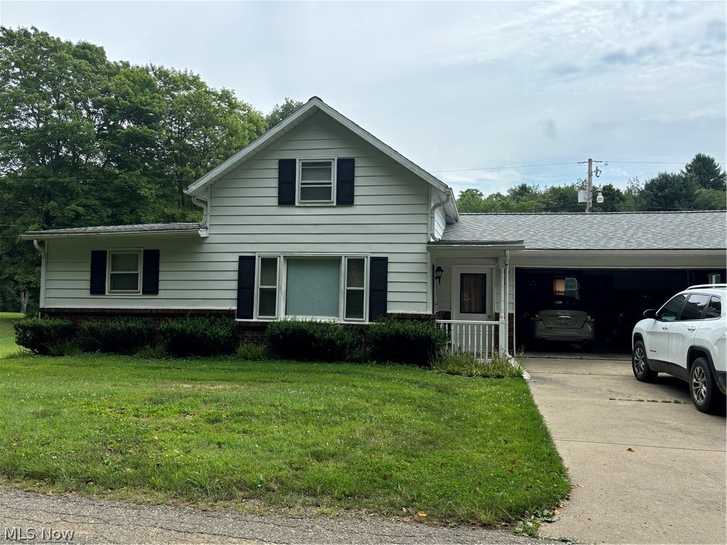 This charming 3-bedroom, 1-bath bungalow is nestled on over an acre of mostly level land, making it perfect for nature lovers and family gatherings. The home features a main-level master bedroom addition, with two additional bedrooms upstairs. Key updates include a new roof in 2021 and a furnace installed in 2021. Convenient main-level laundry, an attached 2-car garage, a large storage shed, and is wired for a whole house generator add to the home's appeal. This property has been lovingly maintained by the same family for over 50 years, and homes in this sought-after area rarely come on the market.