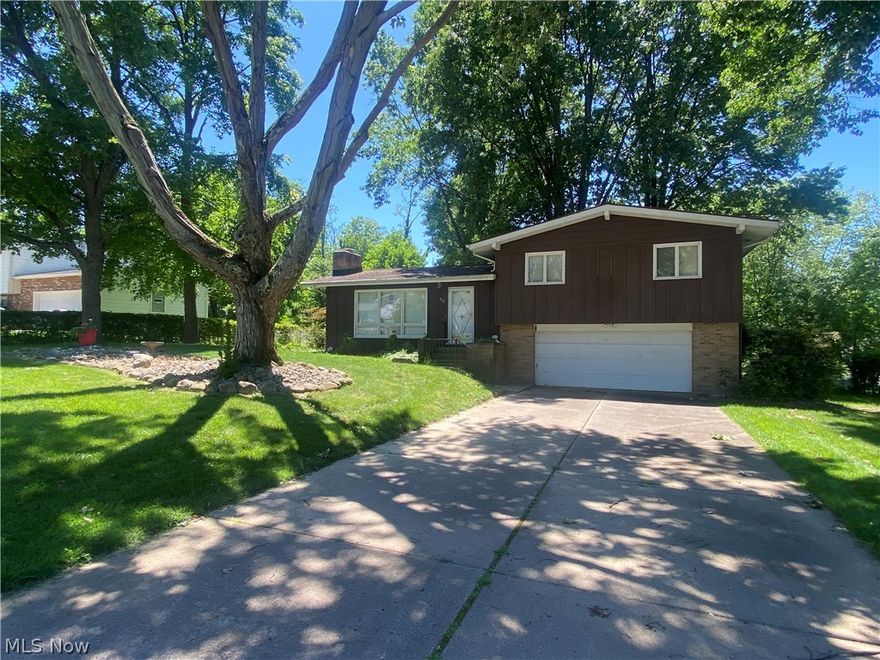 Welcome to 86 Linda Street - A Wonderful Split Level Home on a Quiet Dead End Street in Tallmadge.  Featuring 3 Beds, 1.5 Baths, 2 Car Attached Garage & a Large, Private Backyard!  Entering the home you are welcomed into the Family Room w/ a Gas Fireplace.  Continuing through you come to an Eat in Kitchen with an adjacent Dining Room as well.  Rounding out the Main Level is a quaint Living Room with access to the Deck/Patio out back and a Half Bath.  The 2nd Floor of the home is where all 3 Bedrooms are located along with a Full Bath.  The home does have a pretty nice sized basement for a Split Level set up.  The Exterior of the home is all about it's setting - Starting with the Quiet, Dead End Street and ending with the Large, Peaceful Backyard.    This home is an absolute Bargain in Tallmadge at only $224,900 - with just a little elbow grease this place could sign again in no time!!   Come check it out today!!