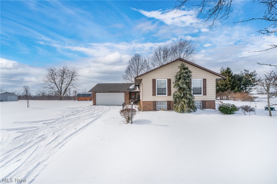 Great home! Start the new year right!! Enjoy the country setting, could be up to 4 or 5 bedrooms, or of course other uses for those rooms. Very well kept and in move in condition. HWT 2021, roof 2015, 3 bedroom and 1/2 bath on second level, lower level very nice family room, 2 extra room with closets, large shower & utility room with storage. Also 1st floor living room, dining room and kitchen- nice entry- a 2 car garage- shed, cemented driveway. Deck, landscaped nicely with River Rock. Seller have never used wood burner