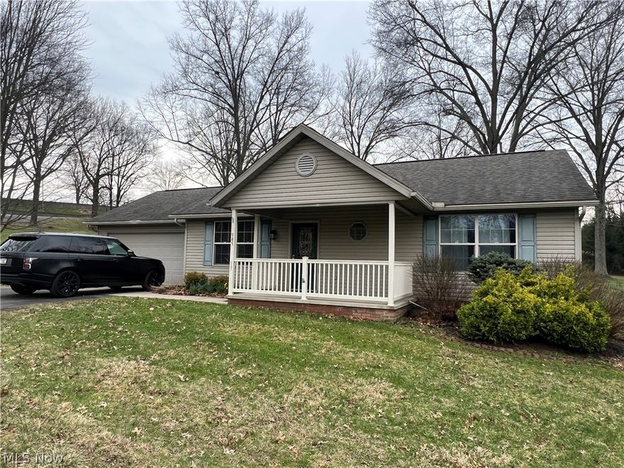 Great starter/downsizing/getaway home with whole house generator right next to Fire Ridge Golf Course! Mostly new flooring and other updates. Come take a look!