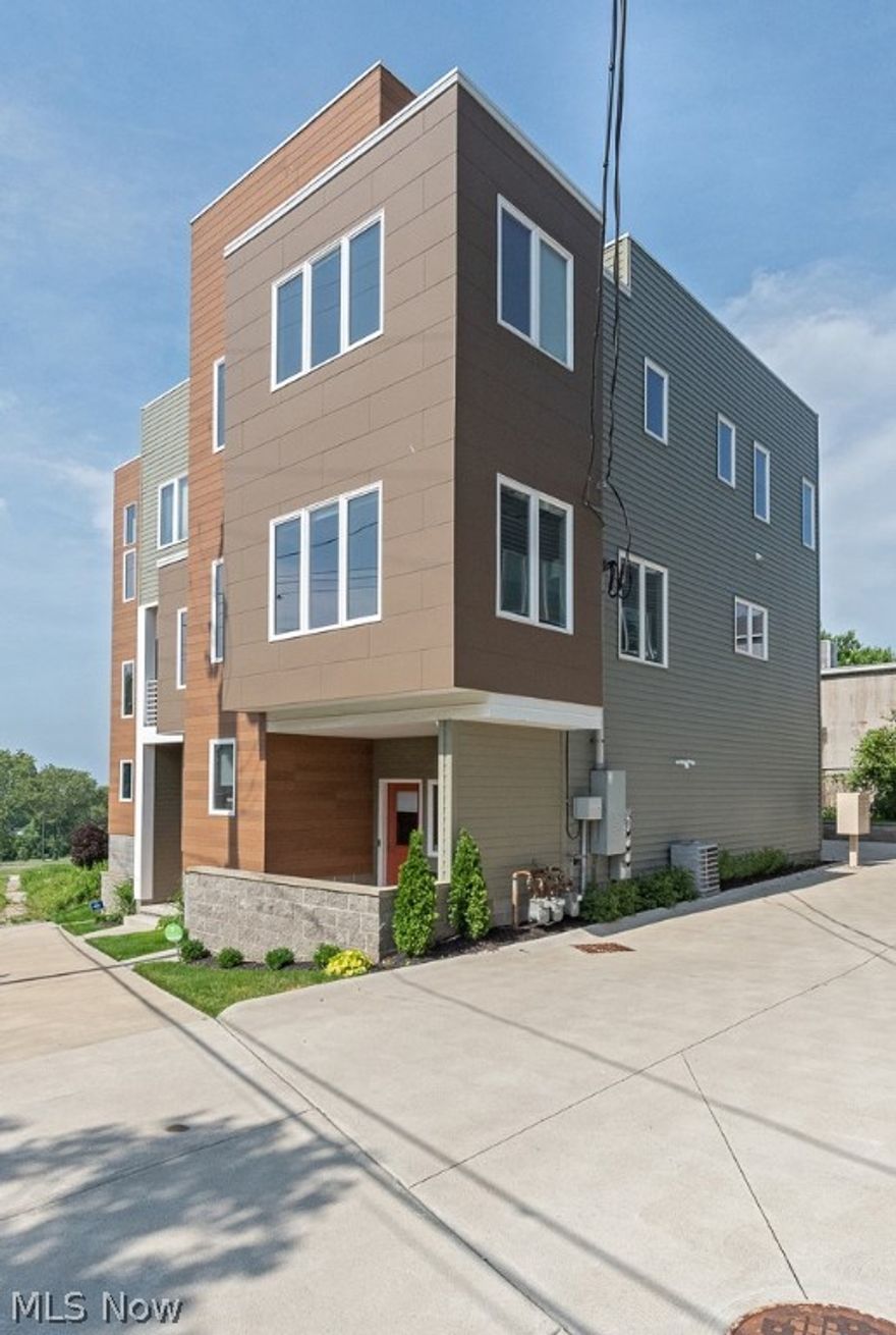 Don’t miss this incredible opportunity to own a townhome in Gordon Square. This stunning 2 bed, 2.5 bath townhome is sure to impress! The first floor offers a two-car garage and an over-sized flex space perfect for a home office. The entertaining floor is perfectly suited for hosting large gatherings for family and friends. A spacious kitchen w/ island & bar seating, quartz counters, stainless steel appliances, balcony, solid oak hardwood, large dining area & great room. Upstairs, your oasis awaits in the master bedroom with lake and city views! A generous closet and master bath complete the master suite. The rooftop level is nothing short of amazing – the lake and city views are some of the best in Cleveland! This home is tax abated until 2029!