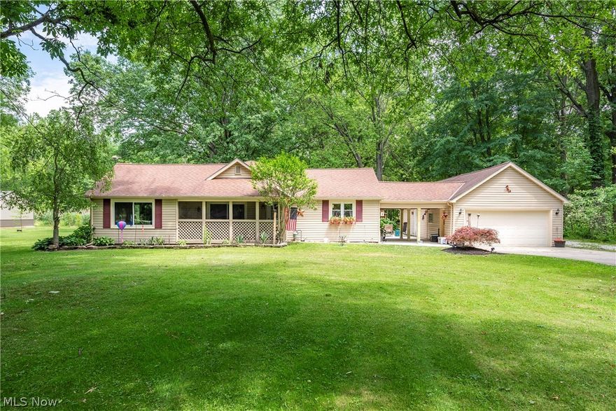 WOW! This lovely three bed two bath ranch home situated on a beautiful 1.29 acre lot all while being conveniently located close to shopping and SR-10, is truly one of a kind. Between the detached two car garage and the home is a new concrete breezeway. Attached to the garage is a large workshop area. Towards the rear of the property is a nicely sized outbuilding for all your storage needs. Inside the kitchen you will notice the ample cabinet space, island with storage, stainless steel appliances, built in desk and custom built corner bench seating (bench will stay). This home features hardwood floors throughout, tile floors in the kitchen and HEATED floors in both bathrooms. There are two skylights in the owners suite and another situated over the soaker tub in the attached bath. The owners suite also has a sliding door to the patio and a large walk in closet. There is a potential fourth bedroom which has a built in murphy bed, perfect for guests! The basement has recently been redone