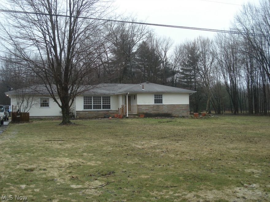 Quality home needs TLC. 4 Bedroom ranch home in Champion Schools!  Three full baths, 2.27 Acres!  Hardwood floors in living room, dining room, and bedrooms.  Basement waterproofed.  Updated electric panel. Septic tested and failed.  Buyer responsible for all costs of new septic system. Soil test completed.