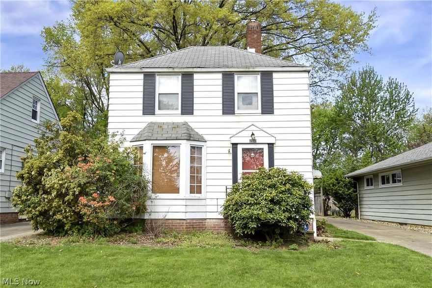 Prepare to be moved! Welcome to your new home in the highly desirable South Hills neighborhood! This charming Colonial-style property is full of potential and waiting for someone to make it their own. As you step inside, you'll immediately notice the cozy fireplace in the living room, perfect for snuggling up on those chilly nights. Enjoy all the character throughout such as the original hardwood floors waiting to be discovered under the carpet in the dining and living rooms, bay window in the living room, arched pass-throughs, and solid wood interior doors. The designated dining room boasts two built-in cabinets to display your china.  The kitchen, complete with an adorable eating booth, is perfect for enjoying your morning coffee or a casual meal with loved ones. As you make your way upstairs to the second floor, you'll find two spacious bedrooms and a full bathroom, providing ample space and privacy for you and your family. With a partially finished basement, you will love the extra space to entertain or enjoy movie nights in. But the true gem of this home is the location. Tucked away on a quiet dead-end street, you'll have privacy and a sense of exclusivity. And if you enjoy spending time outdoors, you'll love that the backyard backs up to Goudreau Park, providing a beautiful and wooded view. This property also offers a detached garage with space for one car, and an additional 2 car garage towards the back of the property adding convenience and extra storage. And with a total of 0.16 acres, you'll have plenty of room to create your own outdoor oasis. Don't miss the opportunity to make this house your dream home. With tons of potential and a prime location, all it needs is a little vision to become a wonderful investment or future home for you. So don't wait any longer, schedule a tour today and envision yourself in this charming South Hills property. But hurry, this one won't last long!