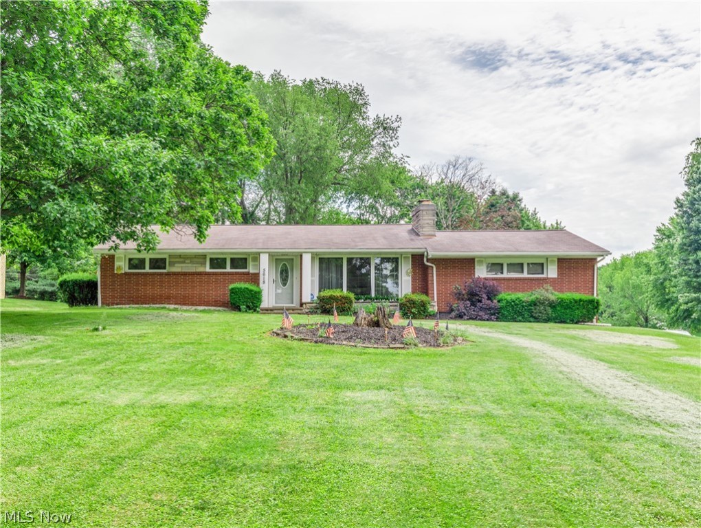 Welcome to this well-maintained brick ranch home situated on a .56-acre corner lot in Plain Township. Plain Schools. The living room is spacious and has a beautiful stone fireplace and large windows (floor to ceiling) overlooking the great front yard. The eat-in kitchen is completely updated with Quartz countertops, new appliances (with a wall oven, a cooktop, etc.), easy-close cabinets & drawers, dimmable lights, tiles backsplash, pantry, a lazy Susan, and a dinette area with sliders to the patio & backyard. There are three bedrooms on the main floor, all with original hardwood floors (one with built-in shelves); A convenient laundry shut, and a lovely full bathroom with a marble countertop, double sinks, glass tiles backsplash, a linen closet, and laminate floors complete the main level. The finished lower level adds an approx. 1,078 sq. ft. of living space, and it features a stone fireplace, a wet bar, a full bath with a walk-in shower, a laundry room with built-in shelves & a utili