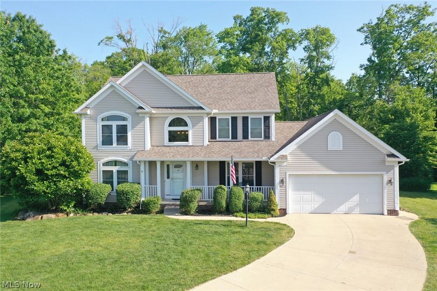 Do not sleep on this lovely four bedroom, two-and-a-half-bathroom Colonial on Cul-de-sac. This beauty boasts a eat-in kitchen with oak cabinets, granite countertops, tiled backsplash, stainless steel appliances, pantry, hardwood floors and breakfast bar. The sliding doors off the kitchen leads to a beautiful stone patio and a spacious backyard with play set and shed. It backs up against a wonderful, wooded area. The family room has a stone fireplace with gas burning logs and the sliding French doors leads to the formal living room. Beautiful hardwood floors in foyer & hallway. Right of the foyer, is a formal dining room. The owner suite has a garden tub, private shower, vanity with dual sinks and walk-in closet. Comes with first floor laundry room. The lower level has a recreation room and beyond it is plenty space for storage and it is pre-plumbed for a third bathroom. Two car attached garage with drain. Covered front porch. Freshly painted, foyer and hall, kitchen and hall, and recre