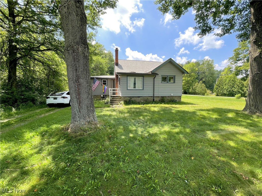 Boasting privacy and the feel of country living, this property is just 10 minutes from all the shopping, entertainment, and buzz of the best that the Youngstown area has to offer. This three bedroom cape cod has plenty of room outside and is a perfect place to enjoy your summer evenings. Located in the award-winning South Range school district. Updates include electric system, basement water proofing, new septic system, and more. Priced to move and with a motivated seller, this one may not last. Come see it before it's gone.