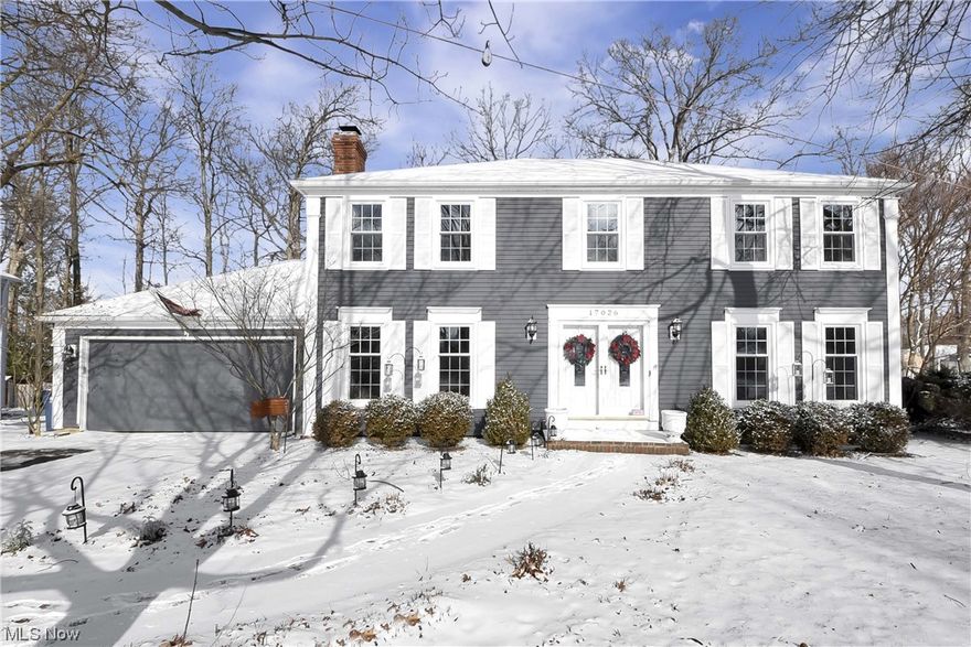Discover year-round relaxation and entertainment in this exquisite colonial home on a cul de sac lot in Strongsville's Hunting Meadows. Step through the double door entry into the 2-story foyer with laminate floors, modern fixture, impressive stairwell and an inviting ambiance. The formal dining/family room, front living room, and hallway to the kitchen unfold seamlessly, creating a perfect flow. The family room, currently utilized as a formal dining room, boasts a wood-burning fireplace, wet bar, and laminate floors. The kitchen is a culinary delight with a walk-in pantry, bay window overlooking the backyard and in-ground pool, tile backsplash and floors, granite counters, ample cabinetry and a sink with a view. The combination dining/living room, currently serving as a home office, offers ample space for curling up with a good book or hosting family and friends. The primary suite is a haven with walk-in closet and updated bath featuring quartz counter, dual sink vanity, and a walk-in shower with beautiful tile surround. Three additional well-appointed bedrooms provide versatile living spaces, including one used as a second home office with laminate floors and built-in shelving. The guest bath is tastefully updated with granite counters and a tub/shower combo with tile surround. Finished lower level is a fantastic space with a tiled game room, a carpeted sitting area with a bar, and built-in bookshelves. A sizable laundry room and ample storage complete the lower level. A bonus 3-season room accessible from the garage is ideal for covered exterior entertaining. The outdoor space is a retreat with an additional patio, a stunning in-ground pool with newer covers and filter, storage shed and a fully fenced yard. New windows installed April of 2023. Fabulous location minutes from several restaurants, shopping, schools, places of worship, and highway access. This home truly has it all.