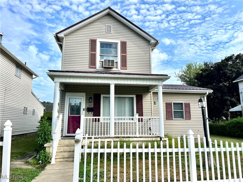 This charming 3BR, 2BA vinyl sided home has been updated offering loads of appeal and convenience. Enjoy the level entry into a nice living room with a gas fireplace leading to the stylish equipped kitchen and dining area with updated cabinetry, pantry and breakfast bar. Completing the main level is a bedroom, full bath and convenient first floor laundry. Upstairs you'll find 2 additional bedrooms and another updated full bath. Step outside for access to the detached garage with alley access and spacious level yard for easy maintenance. Other updates for peace of mind include a metal roof, gas furnace and 200 amp breaker panel. Located in Chester, WV with easy access to everything you need. Don't wait to call on this one!