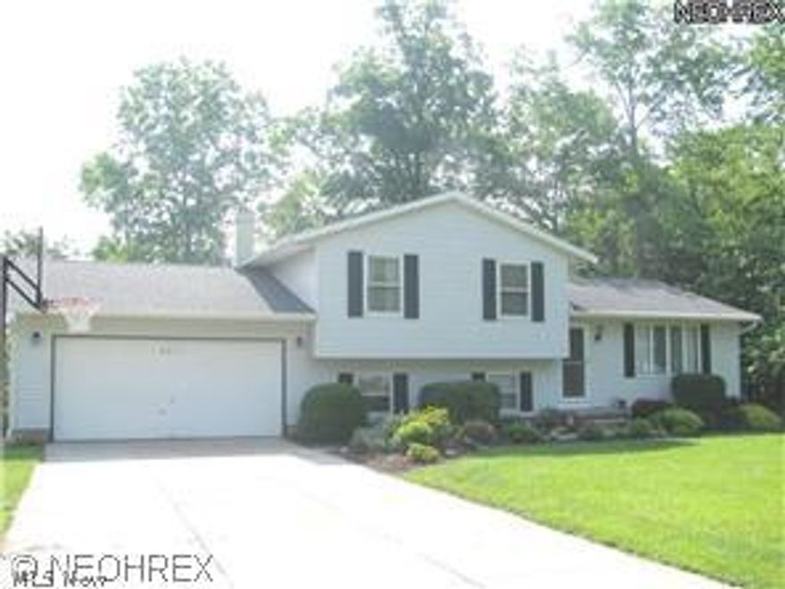 Spacious Split with first floor bedroom and finished basement!!Wooded backyard!!Vaulted ceilings!!Brick wall fireplace in the family rm!!Large deck!!2 full baths!!Half Acre lot!!Many updates including new roof,restaining of both decks,new exterior lite fixtures,new sump pump motor,new furnace,central air,h20 tank,new dishwasher and disposal,new bathtub and toilet,repainted interior plus more!!Neutral Decor!!Move right in!!