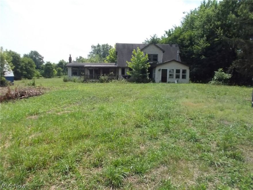 The property borders on the Tuscarawas  River including your own personal island. also includes other Buildings: Huge 107'X95" open-end metal building w/loading ramp. 50X20 metal pole building, 18X24 guest house w/bath, detached 20X40 garage. The home features a great room with knotty pine vaulted ceilings, a deck off the 2nd story master bedroom overlooking the scenic river.  The home has been vandalized. The property was once used as a recycle/scrap metal center. Lots of possibilities.

Terms 10% buyers premium will be added to the final bid to make the purchase price.
10% down the day of sale
49% of any minerals owned will transfer to the new owners