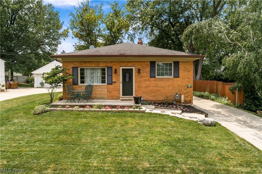Looking for an updated home on a quiet street with a lake view?  Look no further!  This stunning all-brick ranch is ready for its new owner.   Absolutely nothing to do here but move in.  Walking in the front door, enjoy the open concept kitchen with tons of cabinetry, a high end stove with range hood, modern tile backsplash, and recessed lighting.  All stainless steel appliances remain.  The kitchen and dining room overlook the spacious living room with large front picture window.  The three bedrooms offer ample space and an updated full bath with modern raised vessel sinks, and tile tub surround.  In the basement is an additional 1,000 sq. Ft. Of living space, including a large rec room, a separate storage room, laundry room, and second full bath.  The partially fenced in backyard offers a deck and 1.5 car detached garage.  This home is situated on a cul-de-sac which circles a beautiful community lake.  It has its own private dock just steps away from the front door for you to fish, c