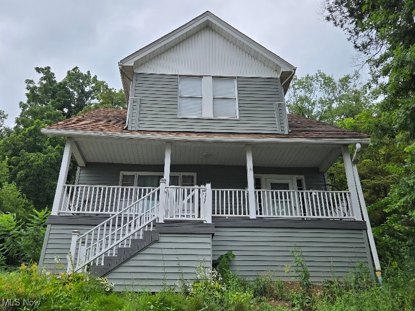 Large 2 Story Home in need of some tlc to ge be great again. Hardwood floors. Large open rooms. Some renovations already done.