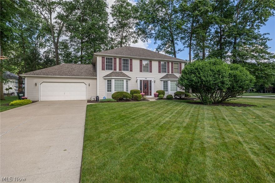 Meticulously maintained 4 bed, 2.5 bath 3,491 sq ft center hall colonial nestled in the Vineyards. This beautiful home boasts a timeless maint free exterior w/ vinyl siding & shutters, aluminum wrapped soffits & wood trim, complemented by a Pella front door w/ sidelights. The 2-car attached garage provides ample parking, storage & work area, & attic for add'l storage space. Step inside the tiled foyer, where you'll feel right at home. The dining room, features luxury vinyl plank flooring, crown molding & a chair rail for added elegance. French doors lead from the formal living room to the cozy family room, complete with a gas log fireplace, built-in shelves and crown molding. The kitchen is a chef's delight, showcasing stainless steel appliances, including a convection oven & microwave, along with chair rail accents & charming wood beams in the ceiling. Enjoy meals in the eat-in area or step outside through the Anderson sliding glass door (2021) to the patio, perfect for outdoor dining. The remodeled master bedroom (2022), offers a tranquil retreat w/ a ceiling fan & walk-in closet. The remodeled master bath (2021) features a soaking tub, tile shower & floor, backlit mirrors & granite counters w/ double sinks. Three add'l carpeted bedrooms, all equipped w/ ceiling fans & ample closet space, provide comfort & privacy for family or guests & share a completely remodeled (2021) full bathroom. Entertain w/ ease in the fully finished basement, remodeled in 2022, featuring a carpeted media room wired for surround sound & built-in shelving. The wet bar area & game room, complete with luxury vinyl plank flooring, is perfect for hosting gatherings. Add'l storage & a full kitchenette w/ appliances add convenience. The backyard oasis beckons w/ a patio & built-in natural gas grill, ideal for summer cookouts. Updates include sump pump (2021), 50 gal water heater (2022), furnace (2022) & A/C (2023) w/ Smart Thermostat. Don't miss the chance to make this wonderful home yours!