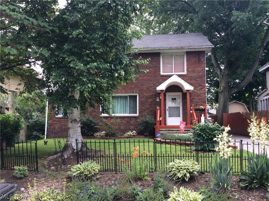 Charming Brick Colonial with 3 bedrooms, 2 baths, fireplace, large deck, fenced yard, shed, 2009 new furnace, 2011 appliances, 2009 windows, 2011 hot water tank.