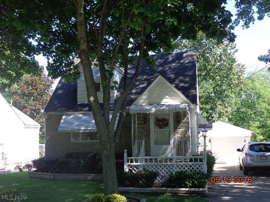 clean as a whistle and ready for a new buyer..don't miss out on this clearview bungalow with space for a third bedroom on the first floor. Other 2 bedrooms and full bath are up. Some updating and very cool retro kitchen and bath. Newer windows throughout, newer furnace, new carpet in Living room, stairs and bedrooms, newer roof, rec room in dry  basement   has it's own kitchen area. Both fireplaces are brick decorative but easily have gas or electric inserts. Newer furnace and water heater too. Exterior is aluminum sided with sandstone front. Paved drive and it looks like a one car garage but what a fooler, behind the garage is a great workshop area and on the back is an attached shed for lawn and garden equipment. attached to the garage is a covered patio and the yard is very nice size with a brick fireplace.
