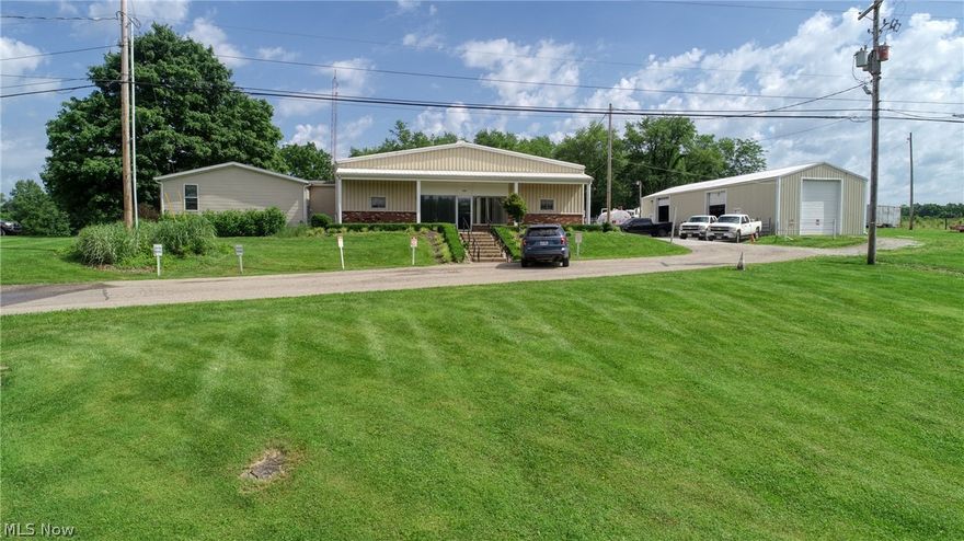 Industrial warehouse space available with the convenient location of State Route 40, Glenn Highway located within minutes to the I 70 corridor.  This property offers over 3650 square feet of office space to include an executive office and conference rooms, dispatch area with locker rooms and a private breakroom.  A storage and parts area all adjacent to a total of 7416 square feet of warehouse/ shop space.  Mechanicals to include  electric 400 amp (3 phase), propane and central air conditioning in the office areas, suspended gas heat in the service area, warehouse is unheated.  Warehouse is equipped with (1) 16' x 18' bay door.  An additional 1968 square foot building with (3) 12' x 14' bay doors.  Located to the rear of the property is a 2880 square foot equipment lean to, all situated on a total of 3.95 acres. Seller will consider lease options.