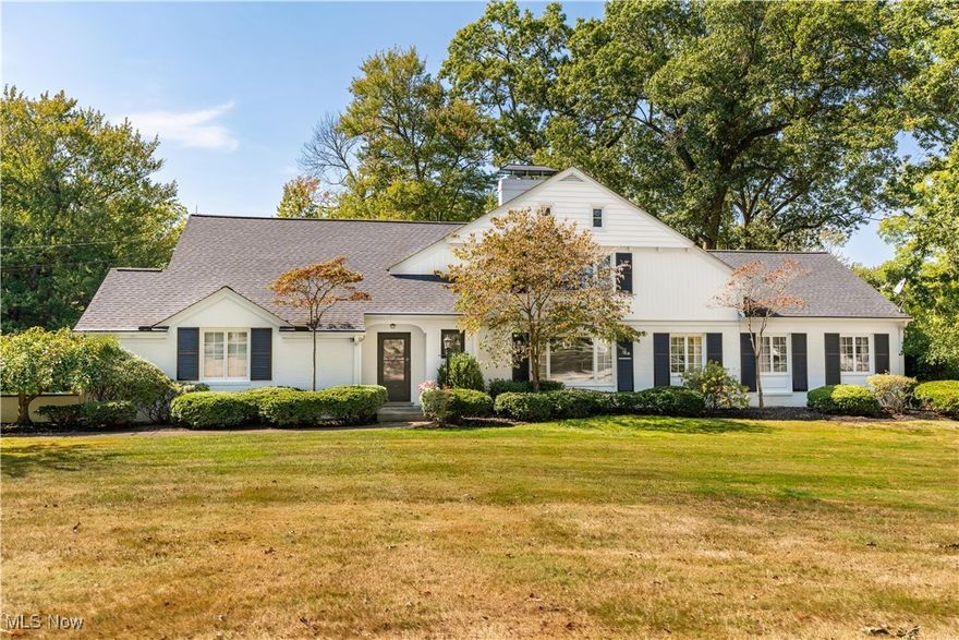 A Must-See in Hartville! This stunning home is brimming with character and charm, offering over 4,500 sq. ft. of living space on a private 3.56-acre lot. From the moment you step inside, you'll be captivated by its unique floor plan, timeless elegance, and quality craftsmanship. The main floor features a grand great room bathed in natural light, highlighted by a beautiful stone-surround fireplace and graceful arched doorways. Adjacent to this inviting space is a potential first-floor master suite with his-and-hers closets, a full bath with stylish tile accents, and a breathtaking study with wood accents and built-in bookshelves. The study can also serve as a second first-floor bedroom, adding to the home’s versatility. Step into the enclosed back porch, where custom rattan flooring sets the stage for relaxing summer evenings while enjoying picturesque backyard views. The eat-in kitchen boasts ample cabinetry, a tile backsplash, and a large picture window with retractable screens for effortless cleaning. A formal dining room, with a statement light fixture and serene yard views, adds to the home’s charm. A convenient half bath and laundry room complete the first floor. Upstairs, you'll find three spacious bedrooms with generous closets and two full baths, including the luxurious master suite. This retreat offers multiple closets, a scenic view of the park-like front yard, and a spa-like private bath featuring a soaking tub, a standing shower, a double vanity, and a walk-in closet. The partially finished basement provides even more living space, with a vast rec room, a brick fireplace with a mantel, a half bath, and ample storage. An attached two-car garage completes this incredible package. Additional features include dual HVAC systems with two furnaces, two A/C units, and two hot water tanks, ensuring year-round comfort and efficiency. Don’t miss out on this one-of-a-kind home! Schedule your private showing today!