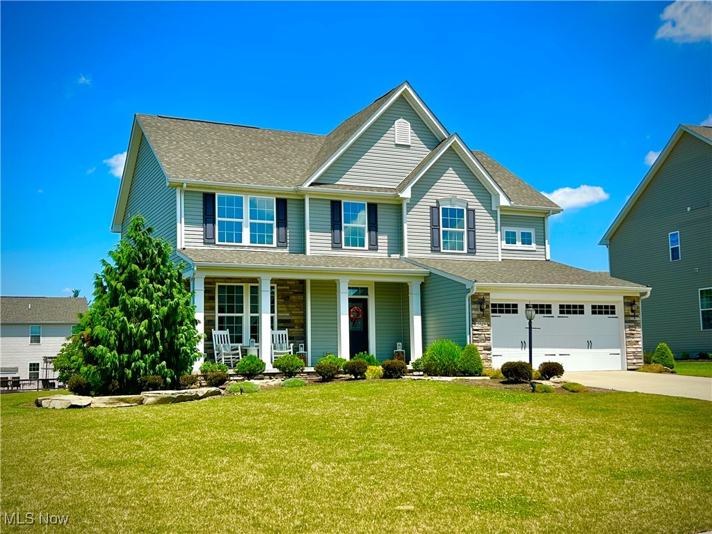 Immaculate 4-Bedroom Colonial in Sought-After Autumn Creek. This beautifully maintained two-story blends timeless architecture with modern comfort, tucked into a quiet, family-friendly neighborhood. Manicured landscaping and a welcoming front porch with stone accents create picture-perfect curb appeal. Inside, 2,687 sq ft of finished living space unfolds in a sunlit open-concept layout, enhanced by neutral finishes and exceptional upkeep. The heart of the home features a modern kitchen with granite counters and 42” cabinetry, a spacious great room with fireplace, and a flexible front room perfect for a home office, dining area, or sitting room. Upstairs, a serene primary suite offers dual walk-in closets, while three additional bedrooms and second-floor laundry provide everyday convenience. An unfinished basement provides valuable storage now with the potential to expand your living space later. This move-in-ready home is nestled in one of Brunswick’s most desirable communities—and it's ready to welcome you home!