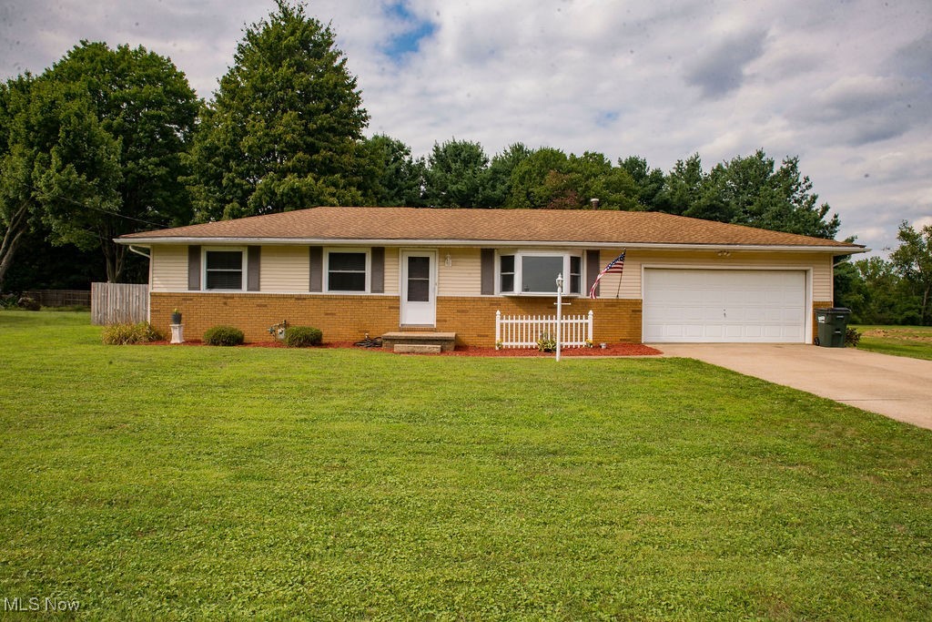This beautifully maintained 3-bedroom, 1-bath home offers 1,400 square feet of comfortable living space on just under half an acre. From the concrete driveway to the updated interior, this home is a true gem. Inside, you’ll find new LVP flooring throughout, a spacious living room, and a stunning multipurpose room filled with natural light — perfect for a home office, playroom, or second sitting area. The updated full bathroom (2023) adds a modern touch, while first-floor laundry adds everyday convenience. The full basement offers endless potential and is well on its way to becoming finished — a great opportunity to add extra living space without the heavy lifting. Step outside to enjoy the fully fenced backyard, ideal for kids, pets, or entertaining. The attached 2-car garage provides ample storage and easy access year-round. Located in the desirable Lake School District, this home offers a peaceful country feel while being close to shopping, dining, and major highways. All appliances stay, making this move-in ready home even more inviting. Don’t miss the chance to make this well-cared-for property your own!