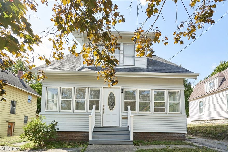 Welcome to this beautifully rehabbed colonial where modern upgrades meet classic charm! Start your mornings in the sun-drenched 3-season room, surrounded by walls of windows. The interior impresses with fresh neutral paint and brand-new flooring throughout the spacious living and dining areas. Prepare to be wowed by the massive kitchen, featuring stunning, floor-to-ceiling Carrara-style marbled tile, a sleek stainless steel hood, custom cabinetry, and an oversized pantry. Upstairs offers three generously sized bedrooms with ample closet space and a fully renovated bathroom. Peace of mind comes standard with a roof and electrical updated in 2018, plus a furnace, A/C, and hot water tank all replaced circa 2022. The exterior boasts fresh paint, newer windows, a large deck for entertaining, and a private, fenced-in backyard. Schedule your showing today!