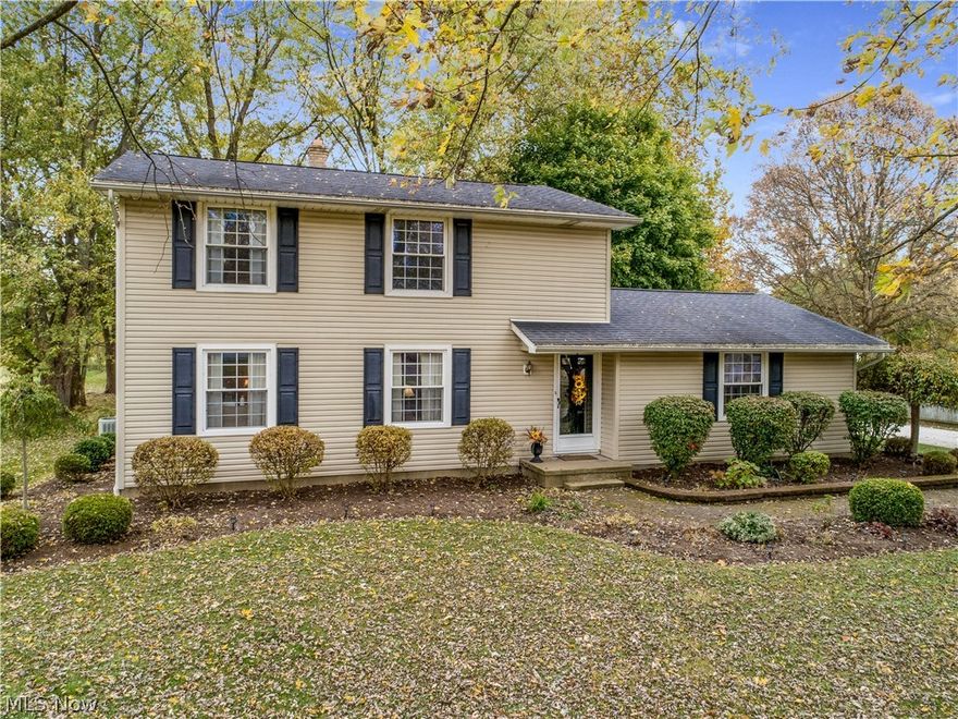 Welcome to this 4 bedroom colonial home in the Tuslaw School District. You are greeted by the professionally landscaped lot of almost half an acre. The home offers a large great room and open dining room and kitchen. The kitchen has newer cabinets and counter top and new flooring in the dining room and kitchen. There is a private bonus room that makes a great office or could be converted to a first floor laundry room. Finally a half bath completes the first floor. The upstairs provides four bedrooms and full bath. Hardwood floors are under the carpet in 2 bedrooms and the great room. The full bath has been recently renovated with new counter top, cabinets and flooring. Replacement windows are throughout the home. Home owner offering a one year home warranty. With a full basement and 2 car attached garage, you can't wait to call this home.