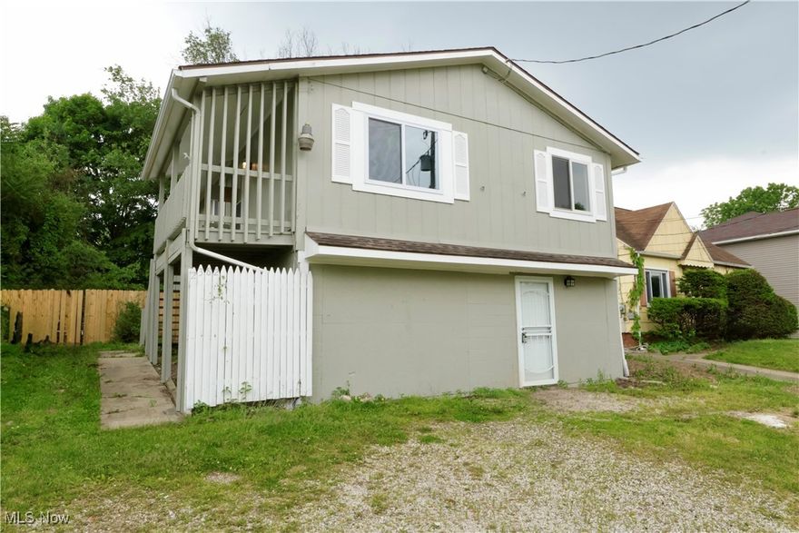 This beautifully renovated home sits midway between Akron and Mogadore. The open concept on the upper level is perfect for hosting. The huge, partially covered deck overlooking the expansive backyard is a great place to relax during the summertime and watch the kids or pets play safely.  The property is in close proximity to Wingfoot Lake, Springfield Lake, and Mogadore Reservoir, surrounded by recreational opportunities.  Book your showing today!