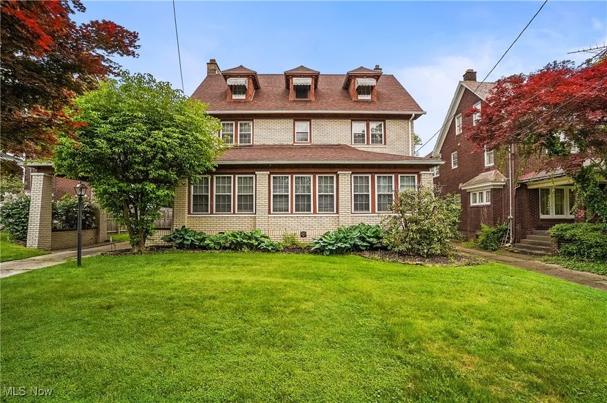 Discover timeless charm and character at 1829 Coronado Ave, located in Youngstown’s sought-after North Heights neighborhood. This beautifully maintained Colonial offers an impressive 3,056 sq ft of finished living space, featuring 6 bedrooms, 5 bathrooms, and a completely finished basement that adds both functionality and flexibility. Enjoy year-round comfort in the enclosed four-season sunroom, a versatile bonus room ideal for a home office or guest suite, and a spacious layout perfect for entertaining. The property also includes a two-car garage, plenty of off-street parking, and a large, well-kept yard. Nestled on a quiet, tree-lined street, North Heights is known for its historic homes, strong sense of community, and proximity to Wick Park, Youngstown State University, and downtown amenities—offering a perfect blend of suburban peace and city convenience. This is a rare opportunity to own a truly expensive home in one of the area’s most charming and established neighborhoods. Schedule your private tour today and experience all this remarkable property has to offer!