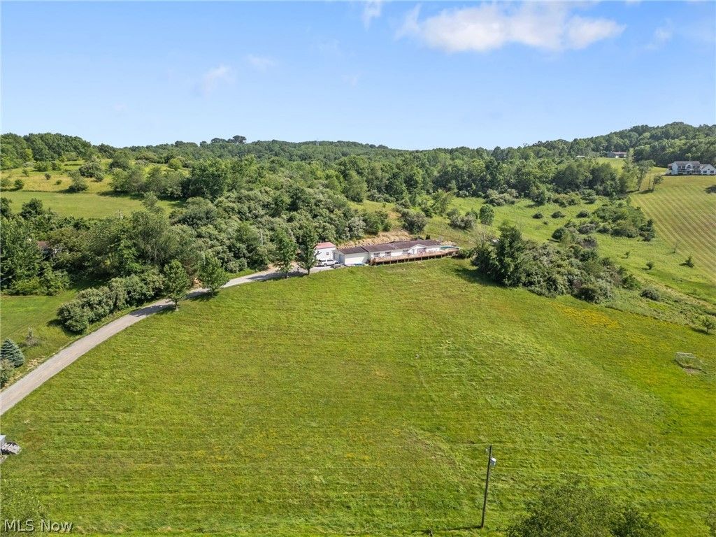 Photo of 7022 Bluebird Road NW, East Canton, OH 44730 (MLS # 5224839)