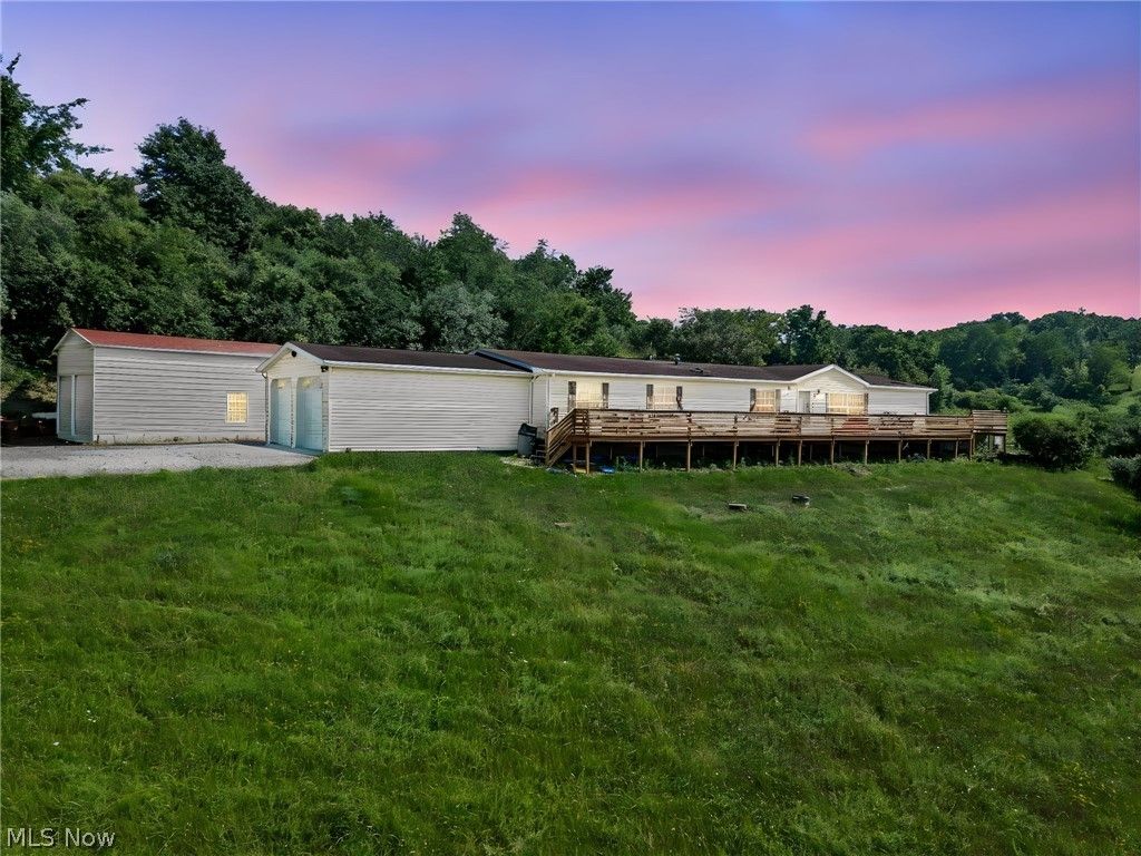 Photo of 7022 Bluebird Road NW, East Canton, OH 44730 (MLS # 5224839)