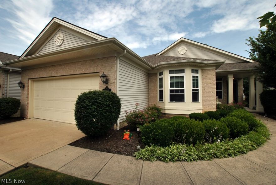 Outstanding 3 bedroom detached ranch cluster home. Foyer with guest closet; formal dining room; living room with vaulted ceilings, fireplace and bar area. Eat-in kitchen with custom cabinets, ceramic tile floor, granite counters, a dinette area with door to sun room. Owners suite with vaulted ceilings, glamour bath with 2 sinks, large soaking tub, separate shower, and a walk-in closet. Sun room w/tile floor and vaulted ceilings with door to custom deck with power awning. New hot water tank 2015. Professionally landscaped with irrigation system. Pride of ownership. Cull-de-sac street. A Must See!