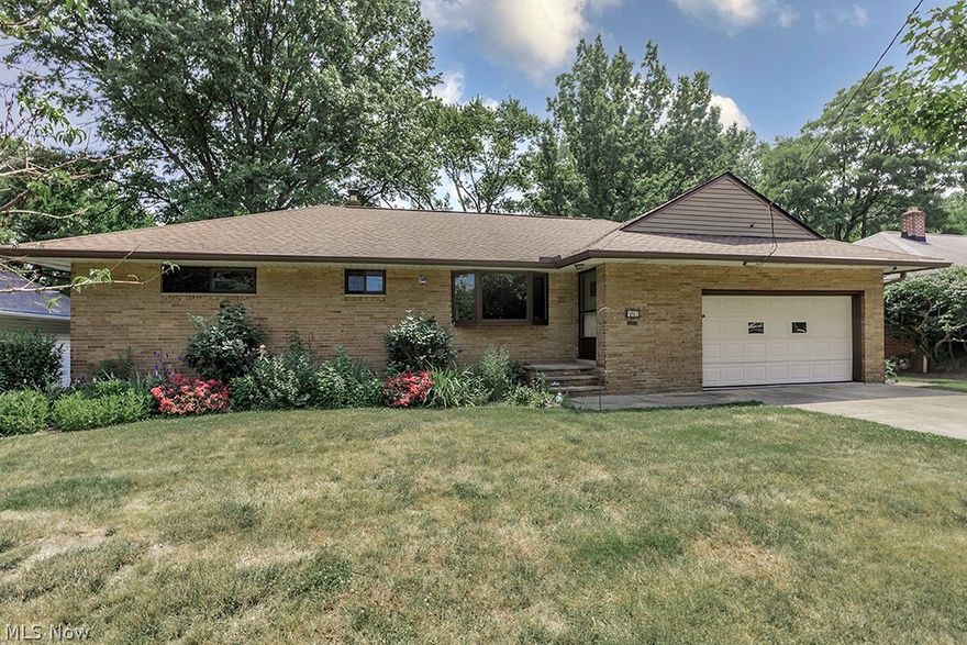 Welcome to single story living! This cozy brick ranch has everything you need on one floor but with the added bonus of a full basement. The spacious living room boasts hardwood floors and a large bay window and flows right into the dining room. The kitchen opens to the family room where you'll find a slider that leads to the large deck with views of the park like back yard and shaded by a beautiful Magnolia tree.  Down the hall there are three bedrooms, all with hardwood floors. The primary bedroom has an ensuite bath with a recently added (2023) walk in shower. The second full bath is shared by the remaining two bedrooms. This home is one of the few on the street with a full basement. There is an oversized rec room and plenty of additional space for storage and hobbies alike. Attached two car garage with storage. Many updates including windows, roof, hot water heater, furnace and garage floor. This home is located on a quiet neighborhood street and if that is not enough..... there is direct neighborhood access to the Eastern Ledge Trail & Euclid Creek Reservation and all that it has to offer. Close proximity to shopping and restaurants as well.