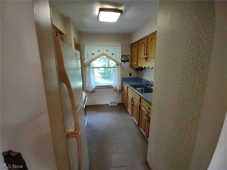 Wonderful Berea location. Ranch style home, with 2 car garage. Living room with fireplace, dining room, kitchen plus 2 bedrooms on the main floor, and 2 bedrooms in the basement with a rec room. First floor full bath and a second bath with a stand alone shower in the basement. The home sits back on a beautiful lot, has a gazebo plus a storage shed. Home is located near Rock River Reservation, have fun on the park trails, bike and golf.