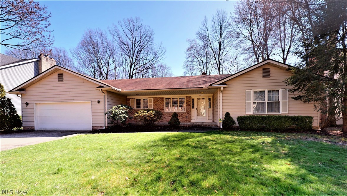 Welcome to 1676 Bobwhite Trail. A fantastic home where you will enjoy superior quality throughout. Designed and built by the owner, every room was carefully planned for the ease and comfort of living. The entire home boasts gorgeous Oak trim, 6 panel doors and Pella windows. The spacious eat-in kitchen offers oak cabinetry with pull out shelving, Corian countertops, a floating island with a butcherblock top and a built in desk area. Drenched in natural sunlight, the great room includes a gas fireplace with a stunning mantle, fireside bookshelves, wet bar, beamed ceiling, and sky lights. There is room for a dining room table if you prefer more formal dining and there is also a built in hutch. The sun room off of the great room features 3 walls of windows and is heated so you can enjoy this room in every season. All three bedrooms are extremely large and offer ample closet space. Two of the bedrooms include an ensuite bath, and the third has beautiful oak built-ins. For your convenienc