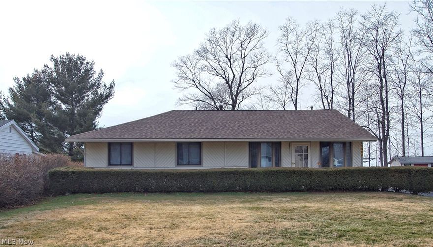 Sprawling ranch with lake views is perfect for entraining or relaxing. You will find a large L-shaped living room that has built-in cabinets & shelves. There is also an area that you can use as bonus space. The kitchen has plenty of custom cabinets & counter space. The formal dining room offers extra dining space or make it a bonus area for an office, play area or craft area. The master bedroom has 2 closets and its own full bath. Don't miss the secret closet behind the shelves in the master bath! The sun-room has a full wall of windows & large skylights. The large 2 car detached garage has a drain & electric. The roof was replaced in 2020. The hot water tank, central air, furnace and air filtration system were installed in 2021. All appliances stay. The home will be point of sale violation free. You can join the Cedarwood Beach Club for an annual fee.