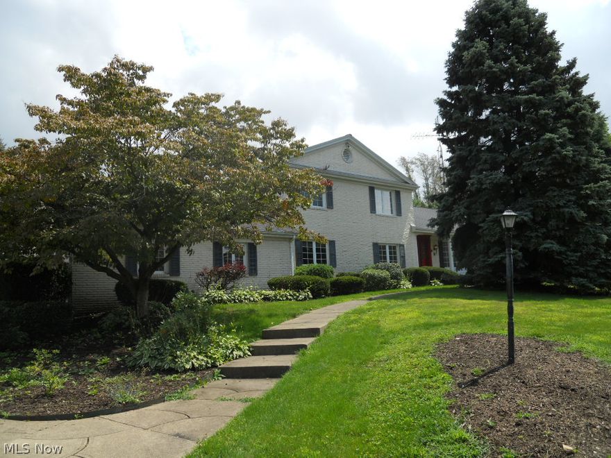 All brick home on a quiet dead end street! All new carpet and new kitchen vinyl. Spacious room sizes with lots of closet space. Amazing detached enclosed salt water pool with full bath and retractable roof. Glazed tile garage--12x28 3 season porch!