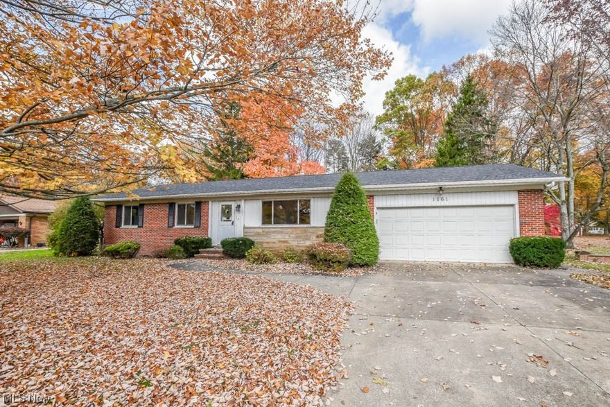 You won't want to miss this spacious ranch nestled on over half an acre with a private fenced backyard and boasting over 2400 square feet of living space! This home is perfect for those who love to entertain, featuring three inviting spaces: a cozy living room, a vaulted family room with a fireplace, and a generously sized lower-level rec room. The open concept makes it easy to stay connected with family and friends while preparing meals in the applianced kitchen.  Down the hall you'll find three bedrooms and two full baths, including a master bedroom with its own private full bath with a step in shower. The 1st floor laundry allows for true one floor living!  Enjoy most seasons from the sunroom, or step outside to the pergola-covered patio, which provides a picturesque view of the park-like backyard. Conveniently located near parks, local amenities and highway access too! Schedule your showing to see all this home has to offer today!