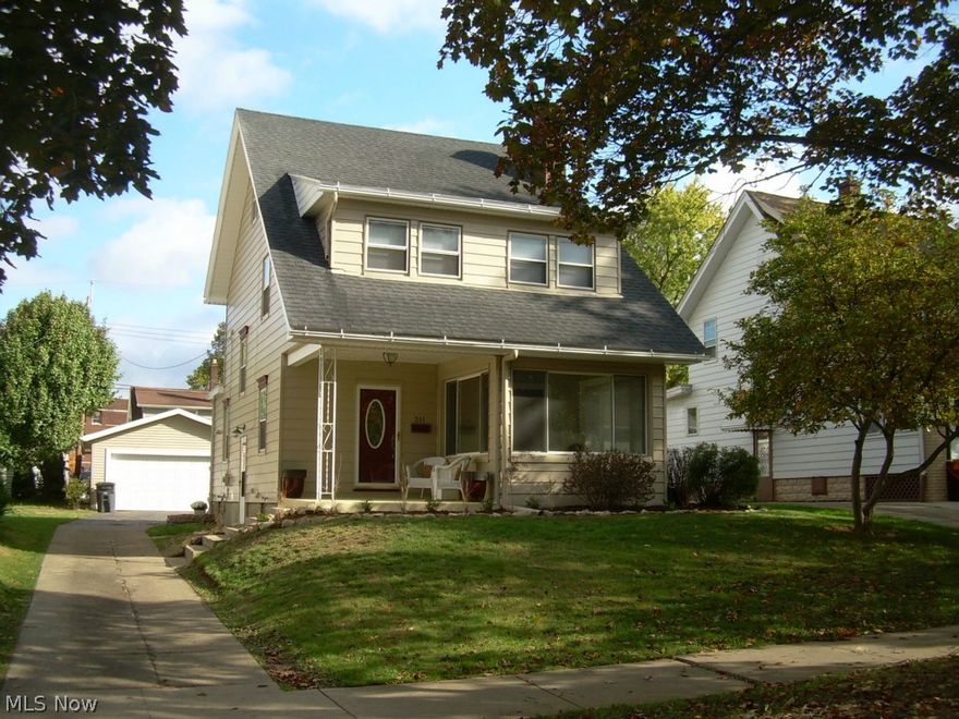 Character as well as everything you would expect and more in a Historic Firestone Park 3 bedroom Colonial!  This home features 3 bedrooms, a full finished attic, woodburning fireplace, central air, 2 car garage, formal dining room, 1-1/2 baths, an updated and applianced kitchen, Corian counters. Great deck
for grilling out this summer.  Tastefully decorated.  Home Warranty...and yes, sits on charming Firestone Parks south Blvd.
